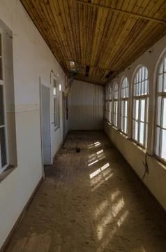 Ruins of once prosperous German mining town Kolmanskop in the Namib desert near Stock Photos