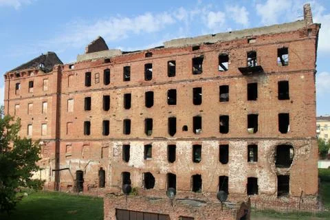 Ruins of red brick mill Stock Photos