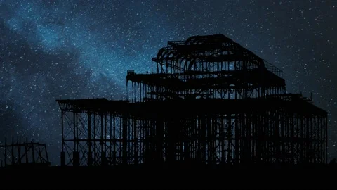 Ruins of West Pier in Brighton, Time Lapse by Night with Stars and Milky Way Stock Footage 168366460