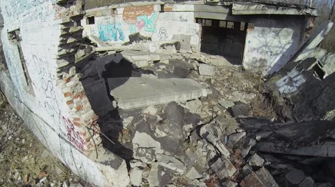 Ruins of workshop edifice lit by sunlight at spring. Aerial view Stock Footage 41763204