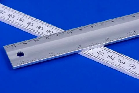 Ruler and angle on blue background Stock Photos