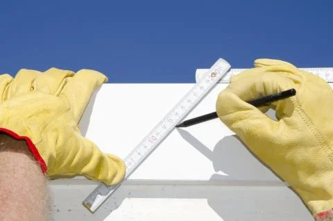 Ruler and pen eith hands of builder outdoor Stock Photos