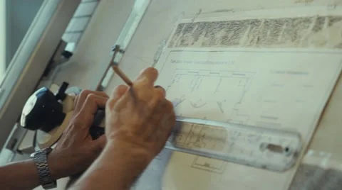 Ruler and a pencil in the hand of the architect Stock-Footage 68123545