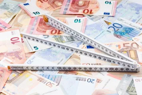 Ruler on a background of money Stock Photos