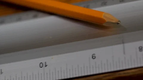 Ruler with pencil close up tools used for measuring. Drafting table equipment. P Stock Footage 121221829
