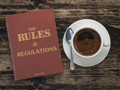 Rules and regulation book and cofee cup on wooden table. Comlience. 库存插图