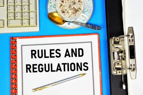 Rules and regulations. Text label on the document folder. Stock Photos