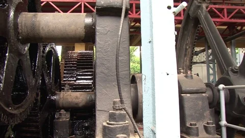 RUM RON RHUM MACHINE GEARS OLD FACTORY ZOOM IN DETAIL OIL Stock Footage 84507796
