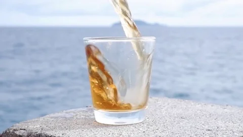 Rum in a transparent glass. Video stock 122245828