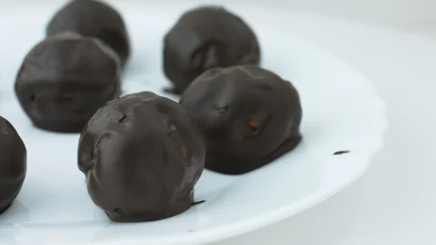Rum Truffles Spinning Side View Stock Footage 100273536