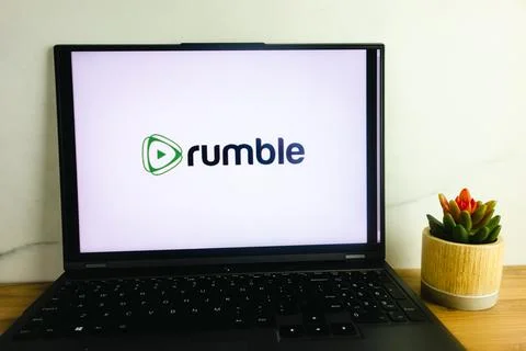 Rumble online video platform logo displayed on laptop Stock Photos