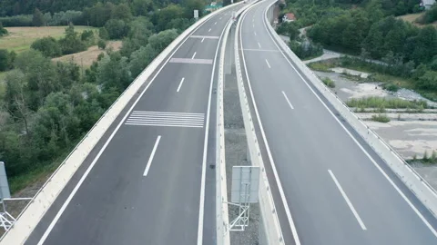 Rumble strips (alert, sleeper lines) for slowing down the traffic Stock Footage 213152334