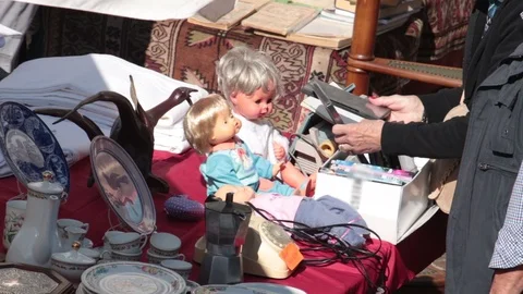 Rummaging in a market Stock Footage 98128575