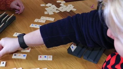 Rummikubs game being played. Stock Footage 238561776