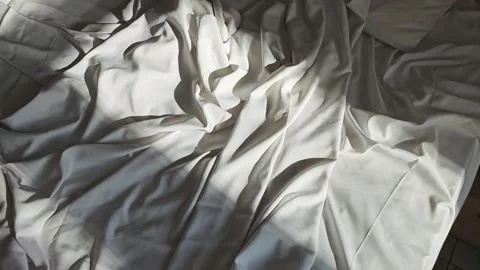 Rumpled blanket on the bed in the morning Stock Footage 280708129
