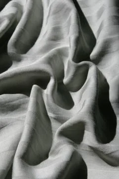 Rumpled striped sheet Foto stock