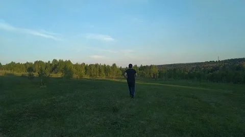 Run across the green field-2 Stock Footage 156175353