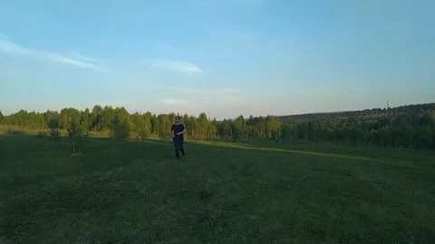 Run across the green field Stock Footage 156175348