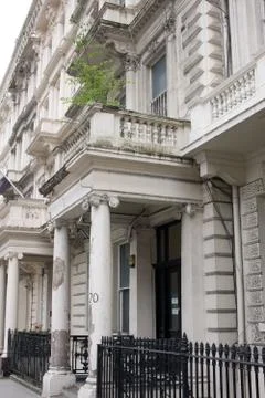 Run down and shabby classical terrace of buildings in London , England, Uk with Stock Photos
