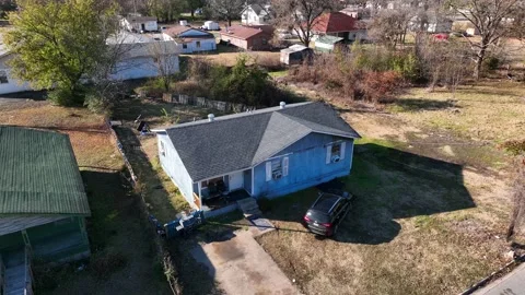 Run down home in disrepair in Deep South USA. Rural poverty and crime Stock Footage 224374084