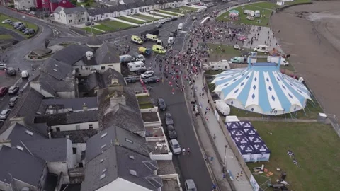 Run Kilkee Half Marathon and Festival, Drone Shot of People on Street and Stock Footage 346213411