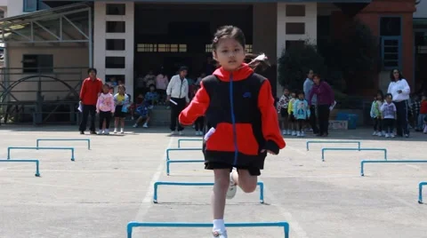Run, kindergarten Students are studying Physical Education in School Stock Footage 59789127