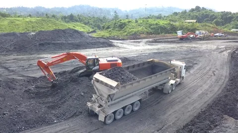 Run of mine (ROM) process at the temporary storage of coal mining results Stock Footage 241963648