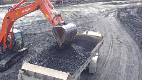 Run of mine (ROM) process at the temporary storage of coal mining results Stock Footage 241966310