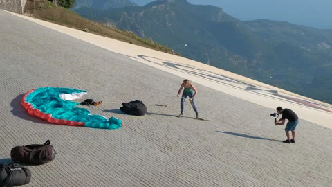 Run on slope with paraglider. Stock Footage 241272333
