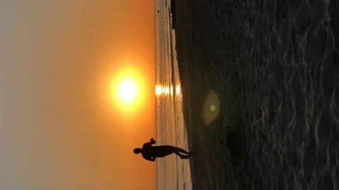 Run at sunset along sea Stock Footage 110843080