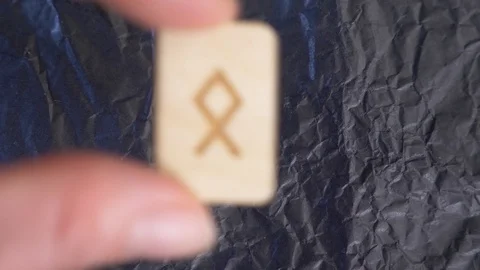 Rune. close-up, hand puts the rune on the surface for divination. 4k, slow Stock Footage 88059936