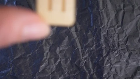 Rune. close-up, hand puts the rune on the surface for divination. 4k, slow Stock Footage 88060269