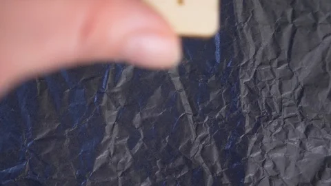 Rune. close-up, hand puts the rune on the surface for divination. 4k, slow Stock Footage 88061309