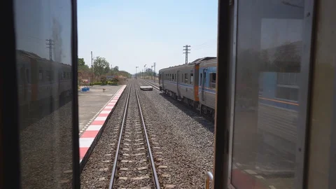 Runing train concept, last bogie bridge stairs on back train running on railway Video stock 122901845