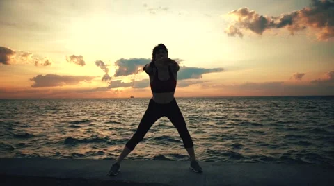 Runner athlete doing exersises at seaside Stock-Footage 67600350