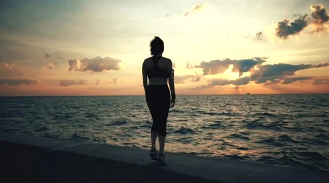 Runner athlete doing exersises at seaside Stock-Footage 67600536