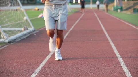 Runner athlete feet running Stock Footage 54625309