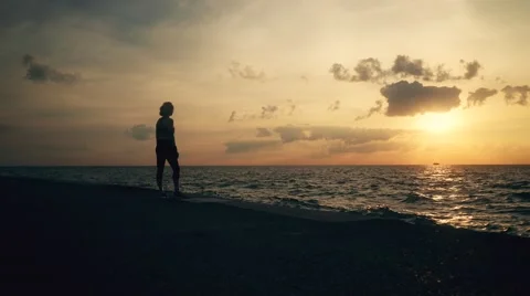 Runner athlete stands at seaside Stock-Footage 67398317