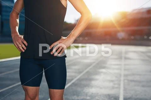 Runner on athletics running track Stock Photos