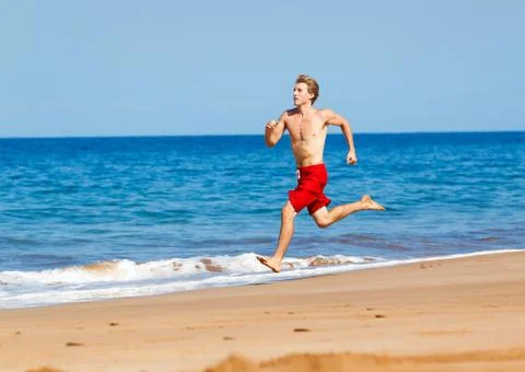 Runner on beach Stock Photos