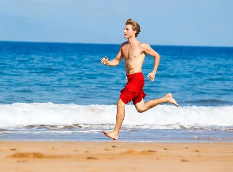 Runner on beach Stock Photos