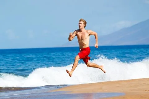 Runner on beach Stock Photos