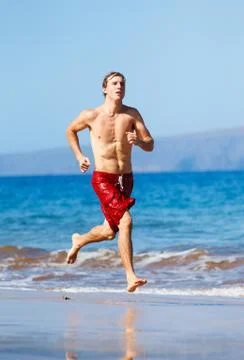 Runner on beach Stock Photos