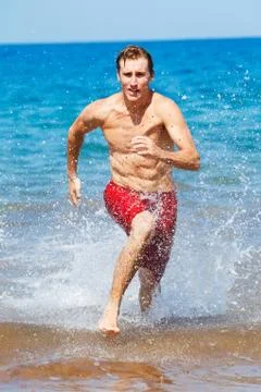 Runner on beach Stock Photos