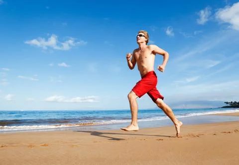 Runner on beach Stock Photos