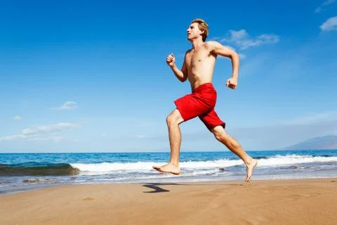 Runner on beach Stock Photos
