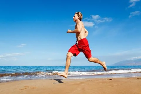 Runner on beach Stock Photos