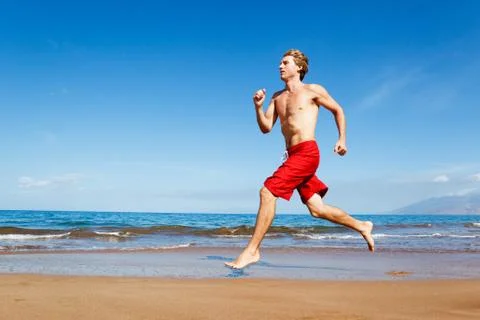 Runner on beach Foto stock