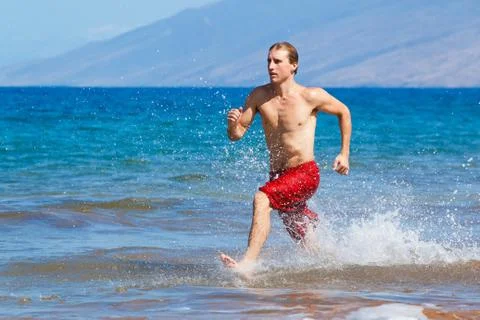 Runner on beach Stock Photos