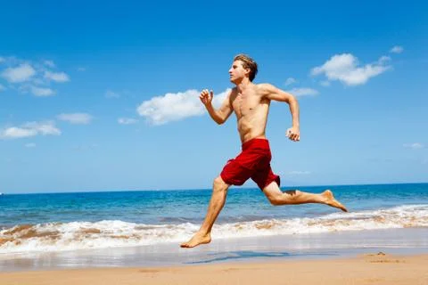 Runner on beach Stock Photos